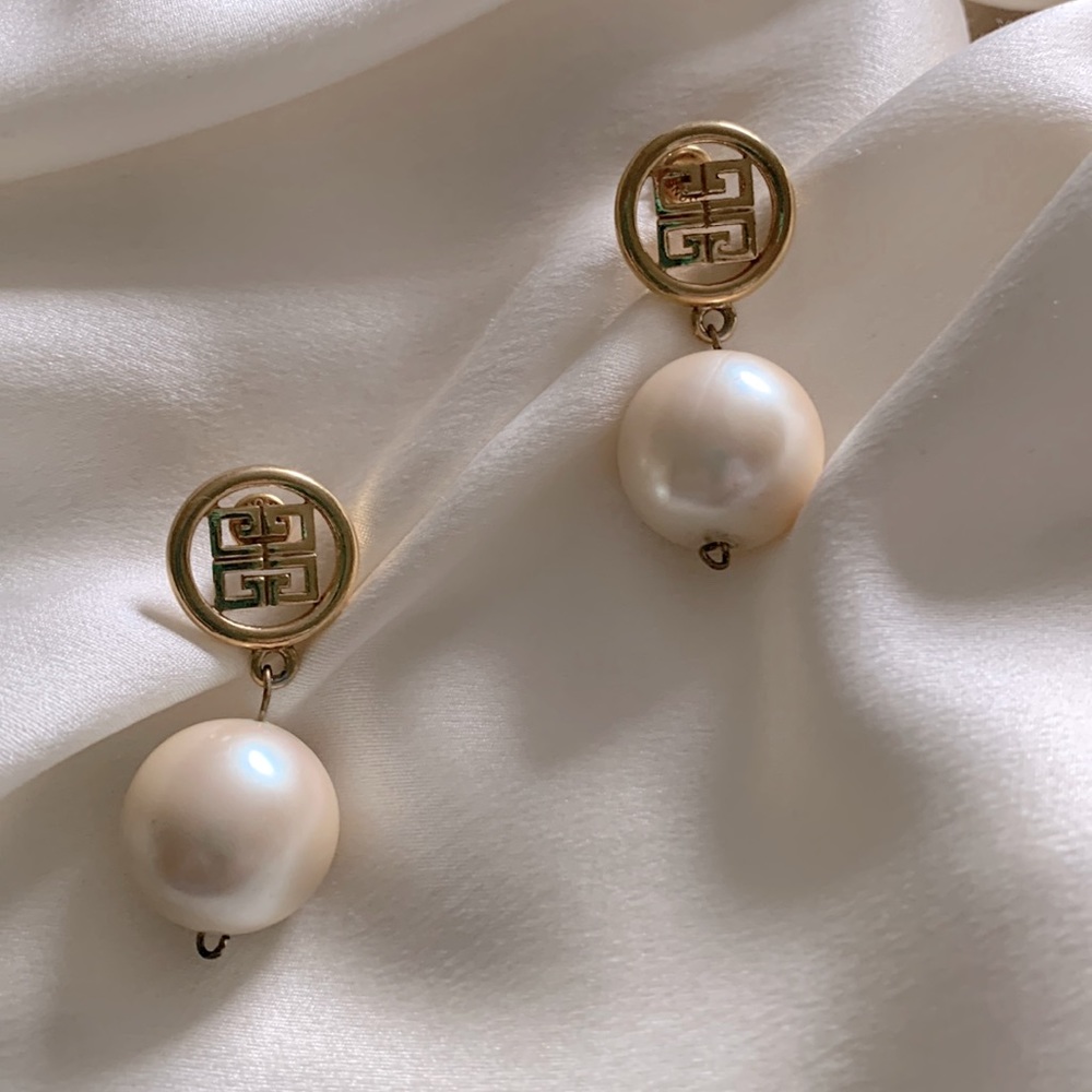 Gold and large pearl dangling post earrings